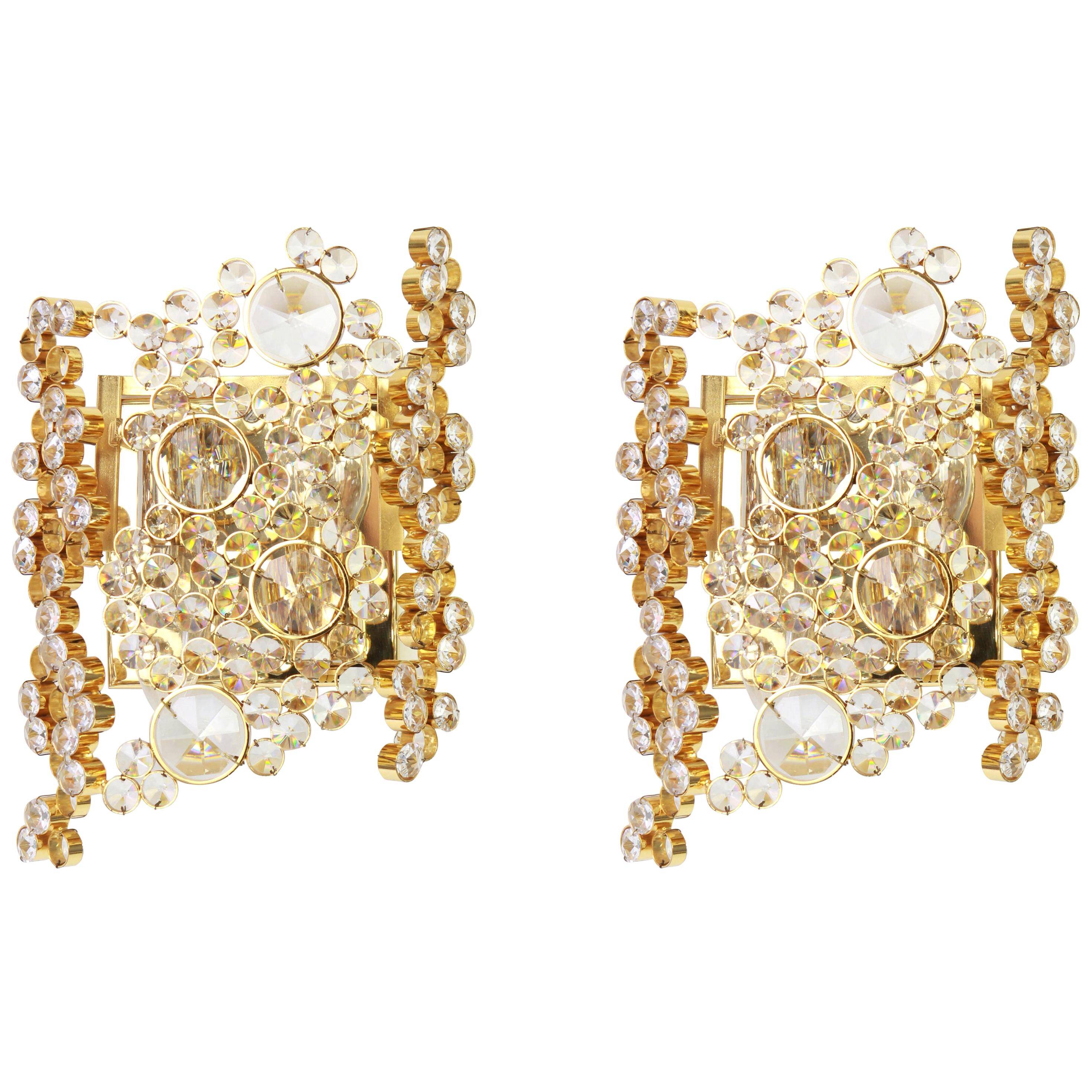 Pair of wall sconces in gilded brass and crystal by Palwa, Germany, 1960s.