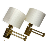 Two wall lights with articulated arm in gold metal Egolux