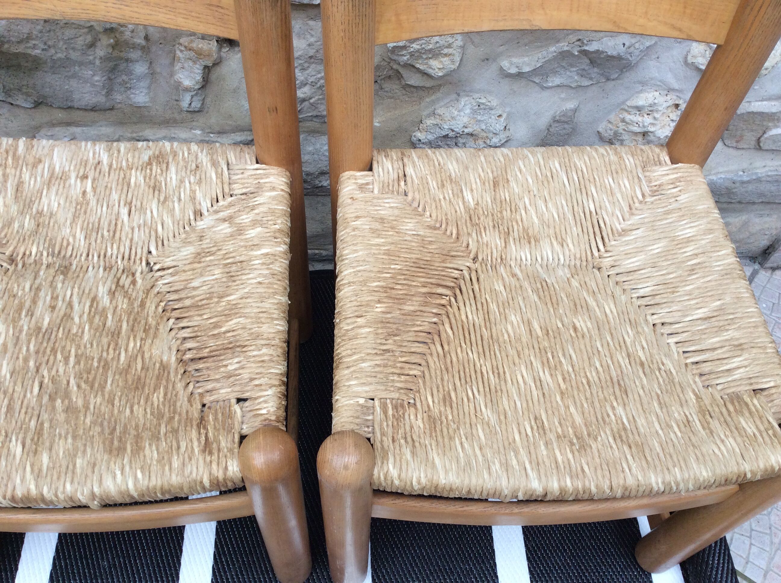 Straw seated wooden chairs