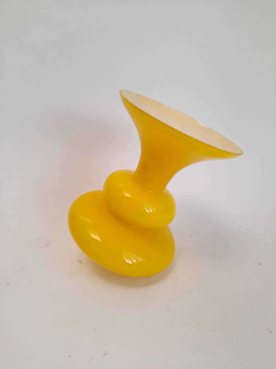 Wobble vase in yellow opaline artisanal glass