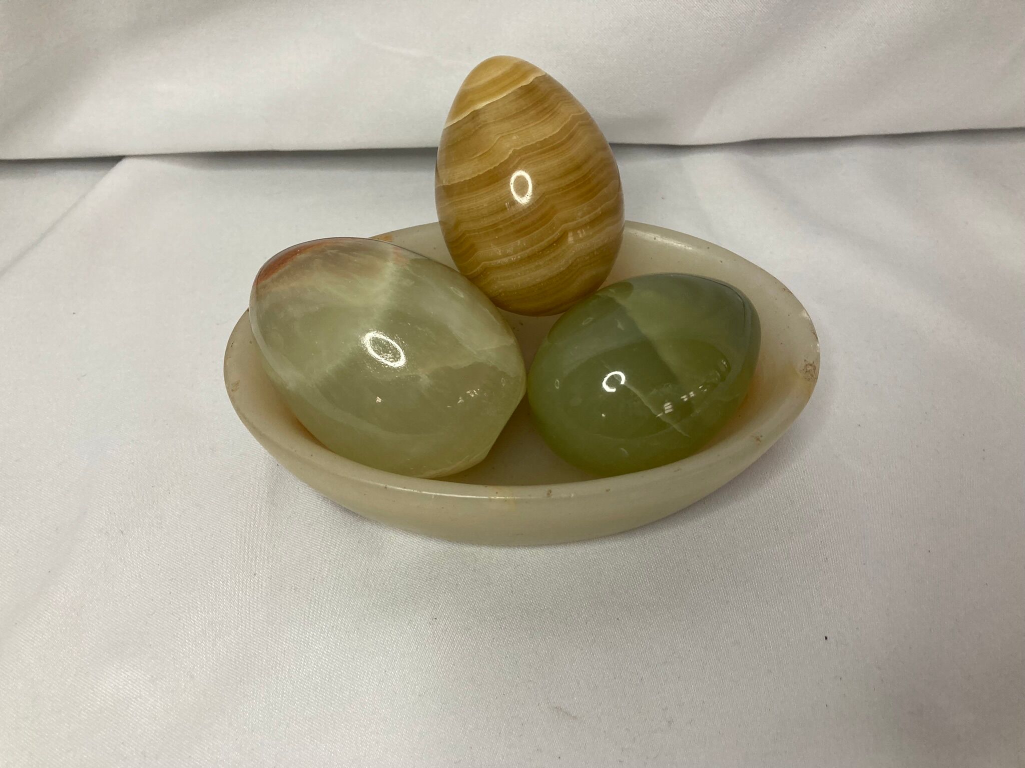 Series of three onyx eggs and XXth cup