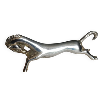 Un porte-couteau cheval métal argenté