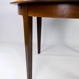 Dining table in rosewood with two extension plates, of danish design from the 1960s.