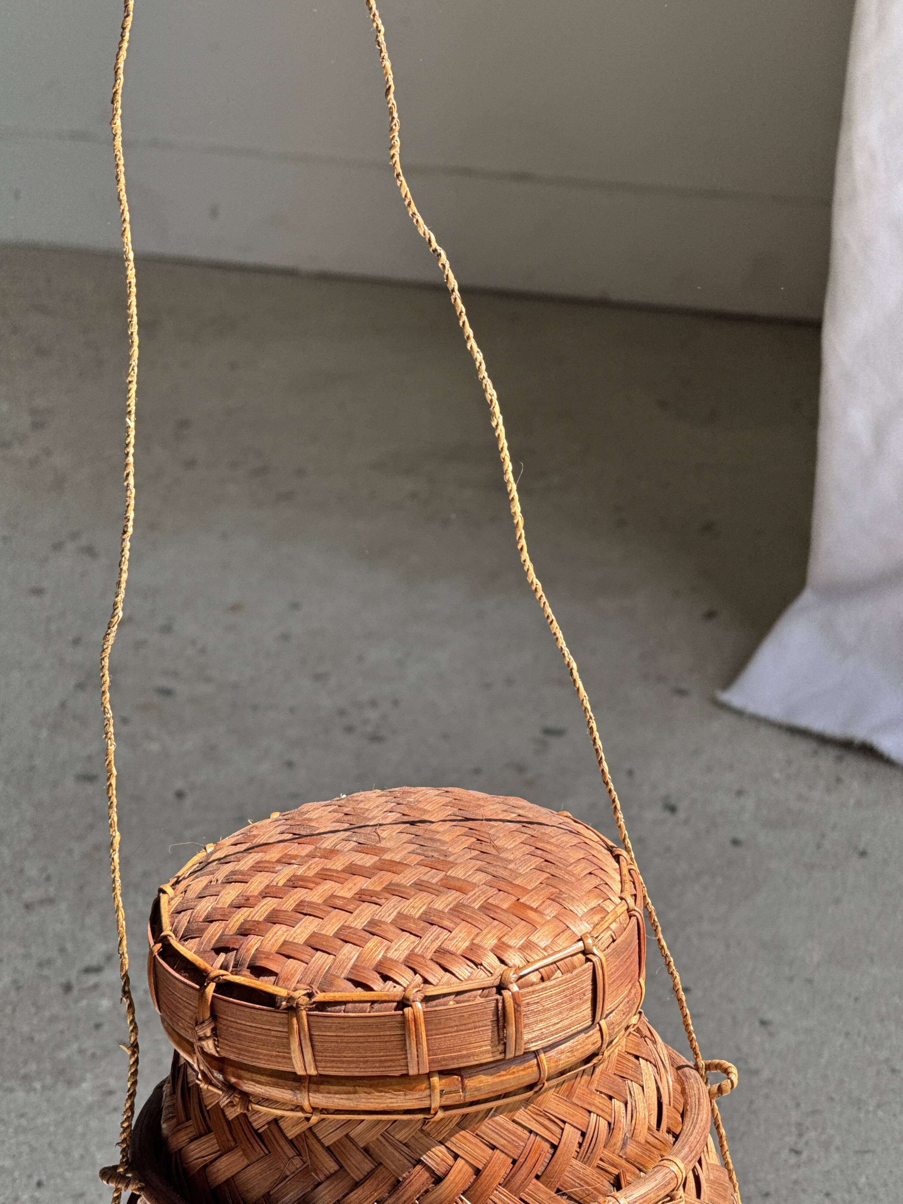 Small traditional Balinese basket with cords H47 D19 0.5kg