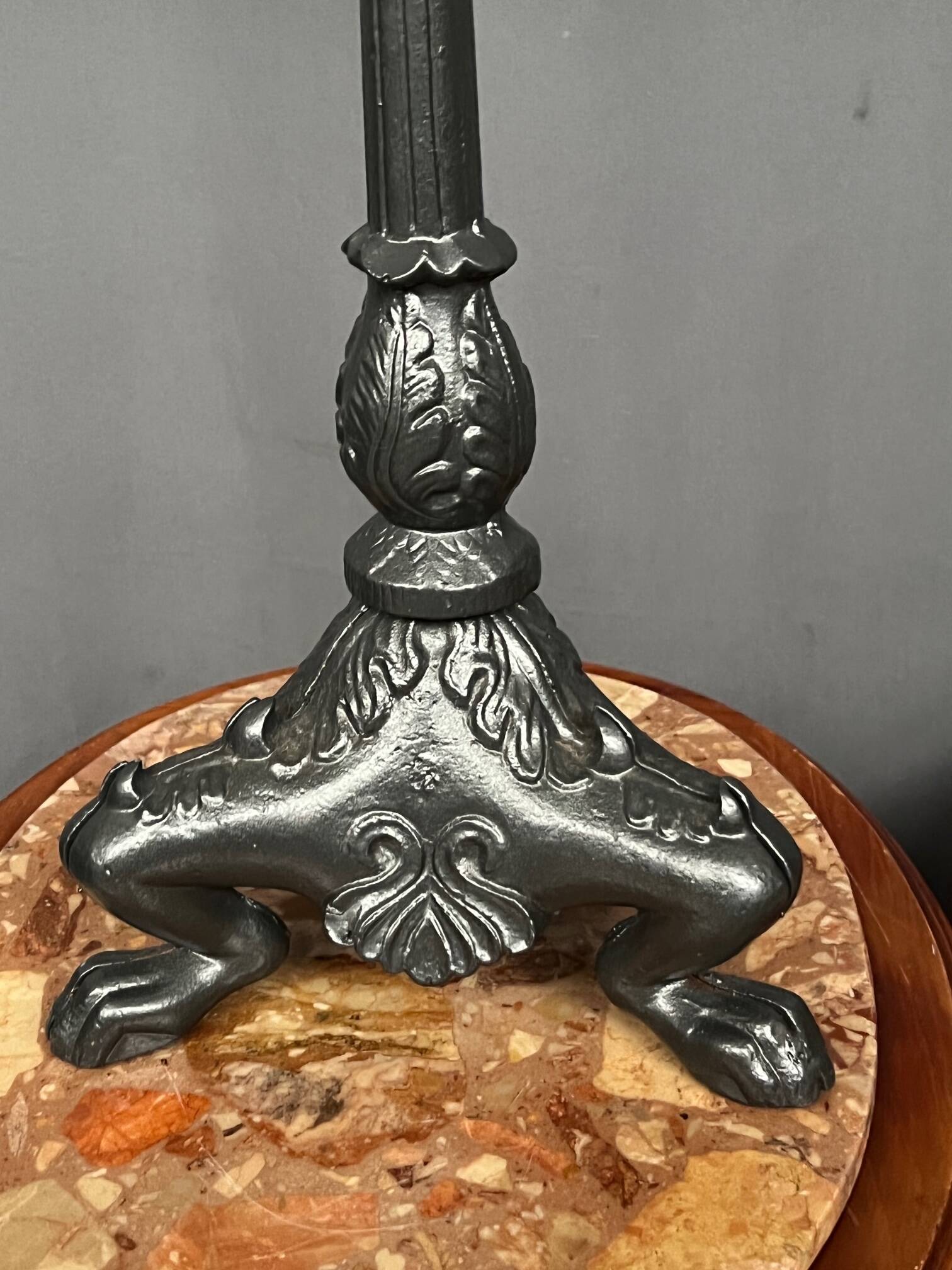 Pair of massive cast iron candlesticks in Renaissance style.