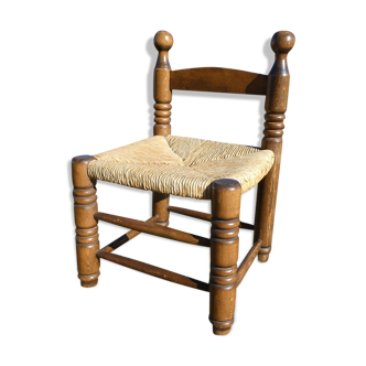 Chaise basse paillée tressée