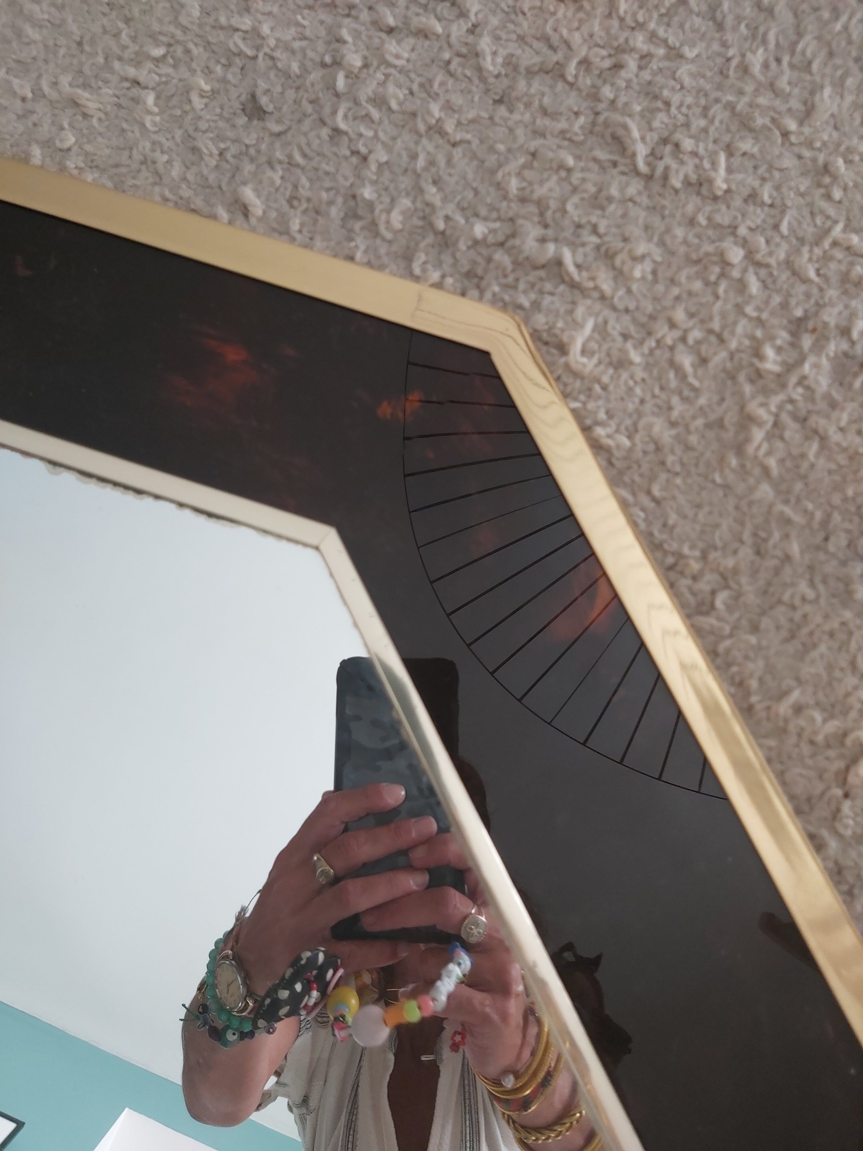 Octagonal mirror 70s in magnifying glass and brass