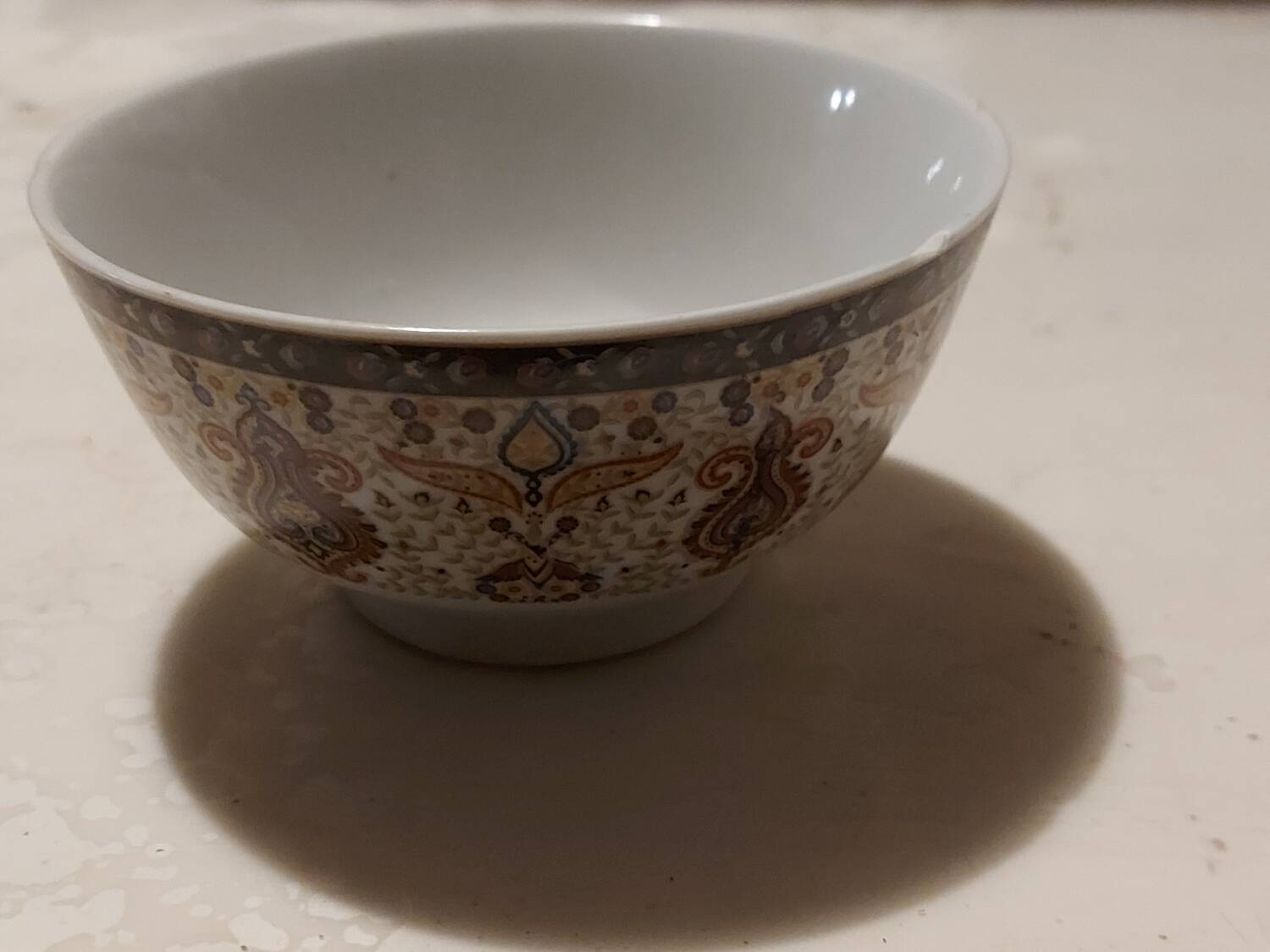 Set of oriental bowls and spoons