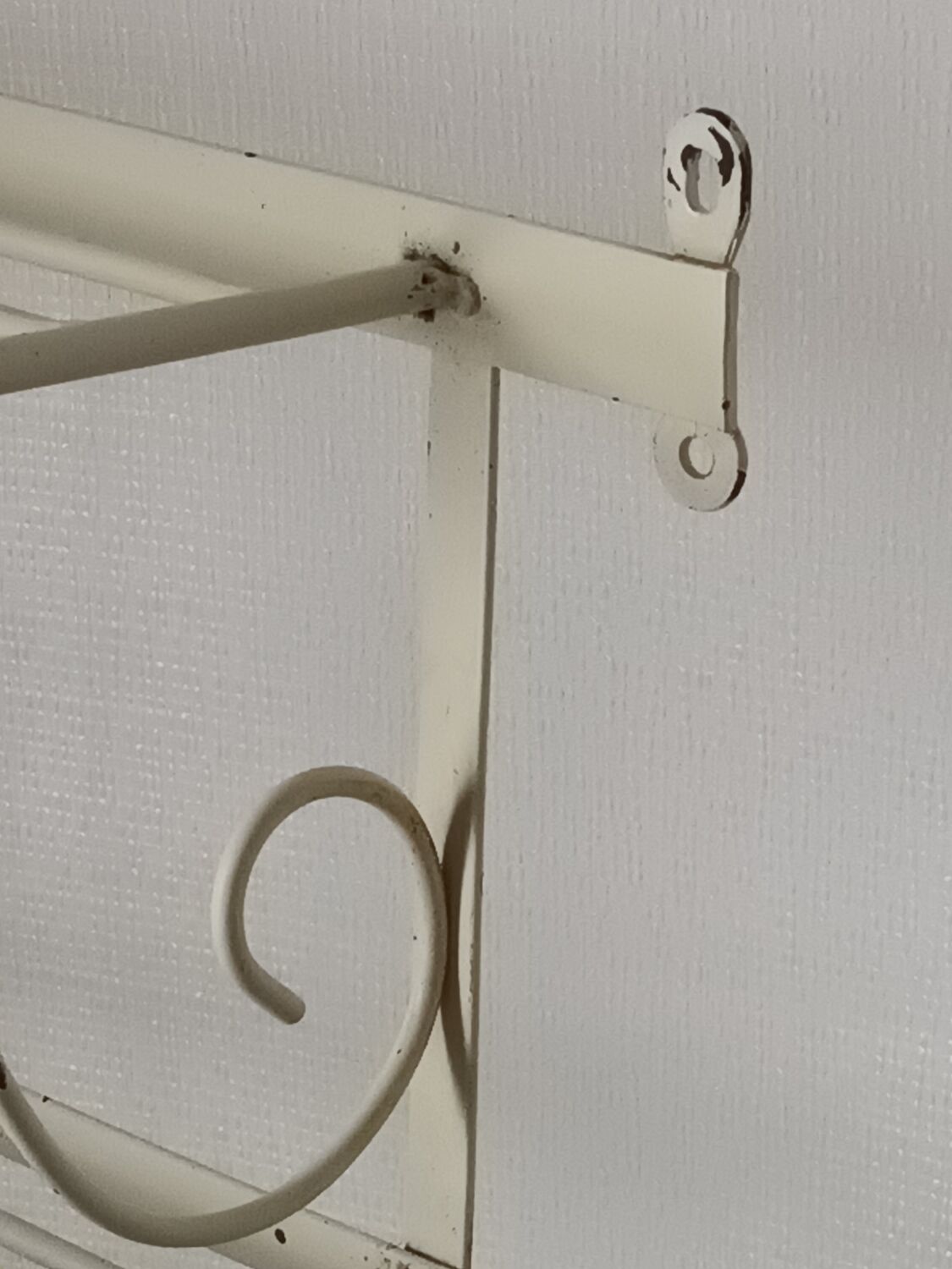 Vintage wrought iron wall coat rack