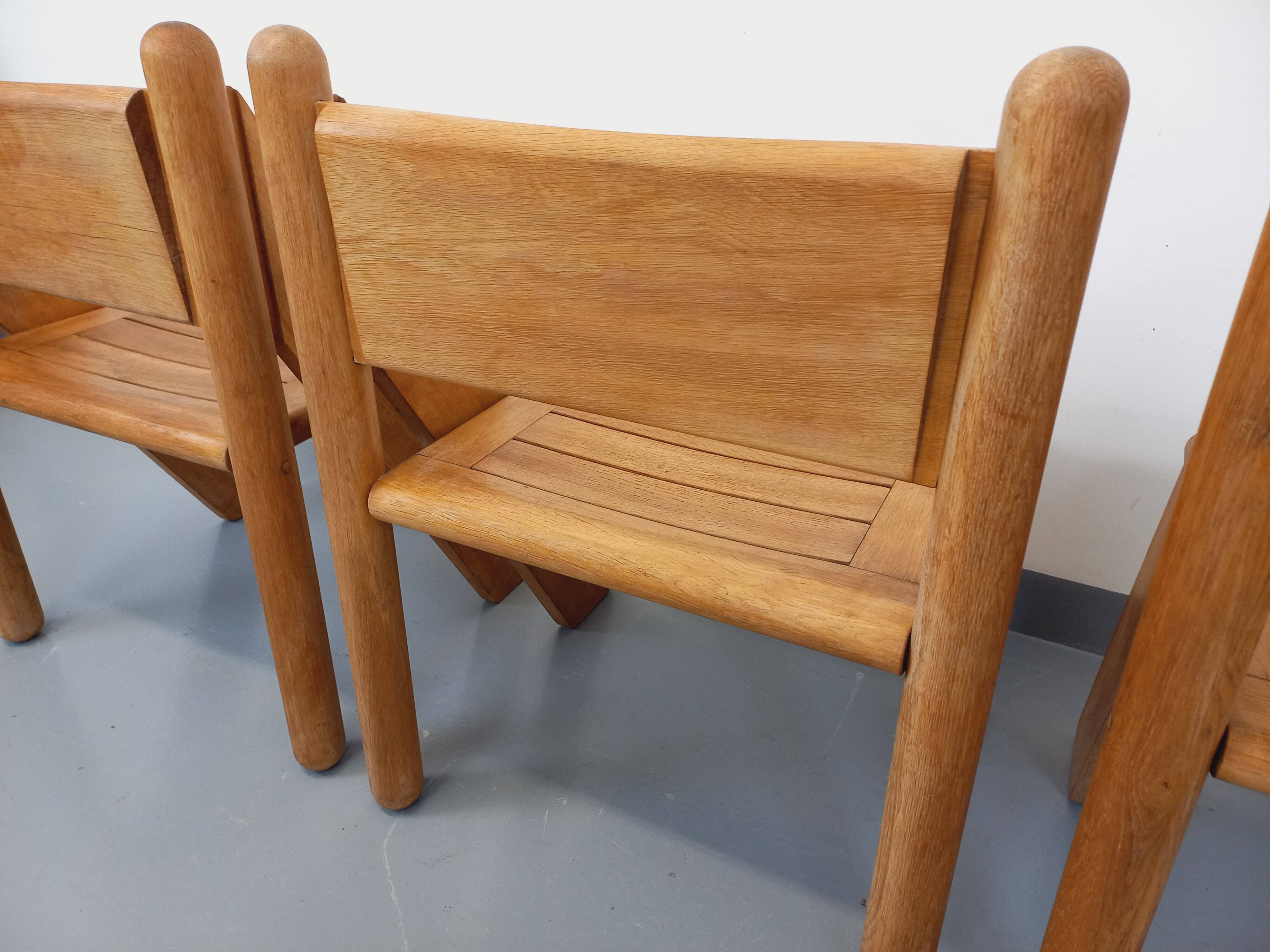 Set of 4 vintage brutalist chairs in solid oak from the 1960s.