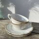 Pair of fine white and gold Limoges porcelain teacups