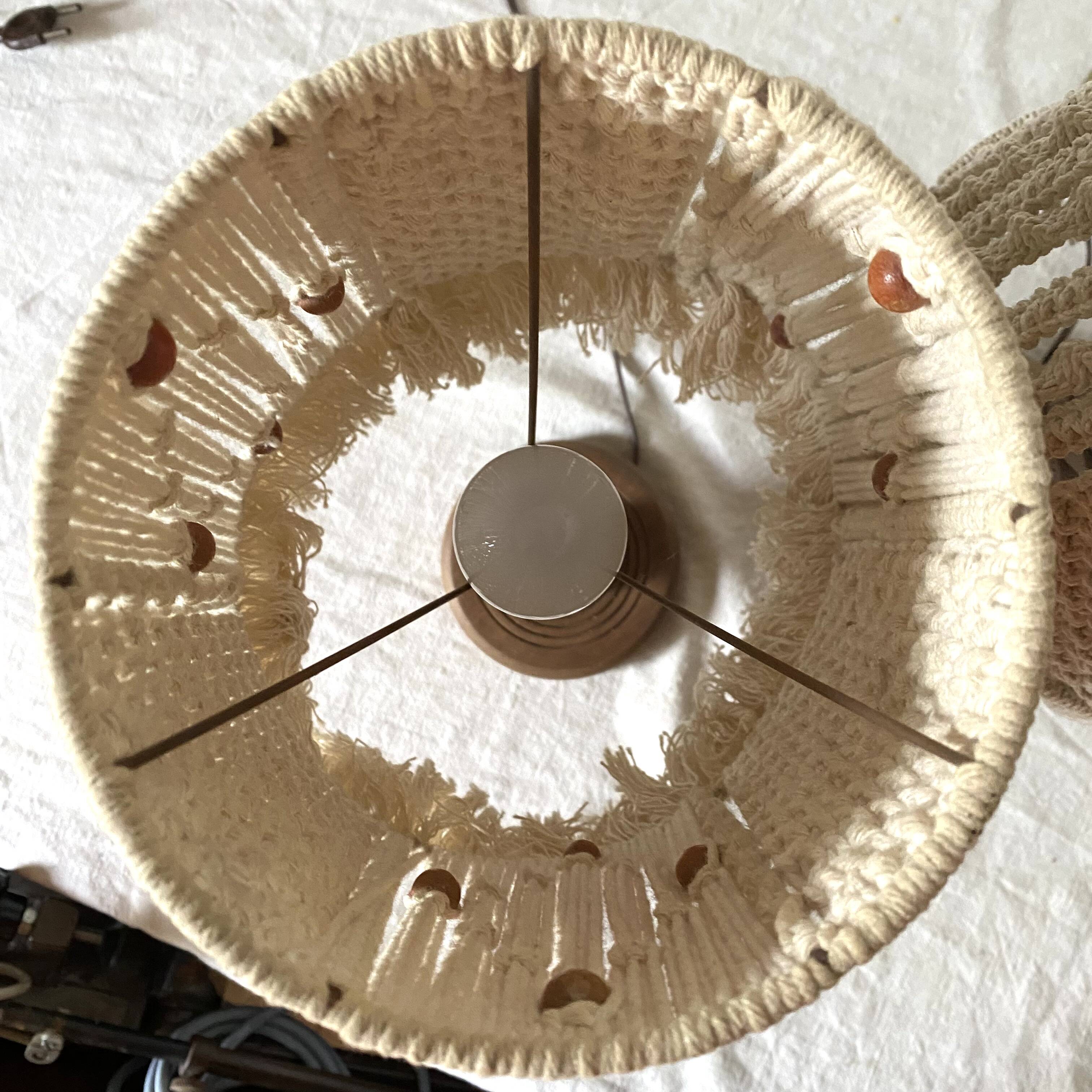 Pair of carved wood and macramé bedside lamps