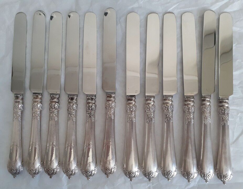 12 knives with silver-plated handles