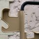 Beige and black coat rack Manade by Jean-Pierre Vitrac
