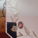 Beveled mirror with floral decor