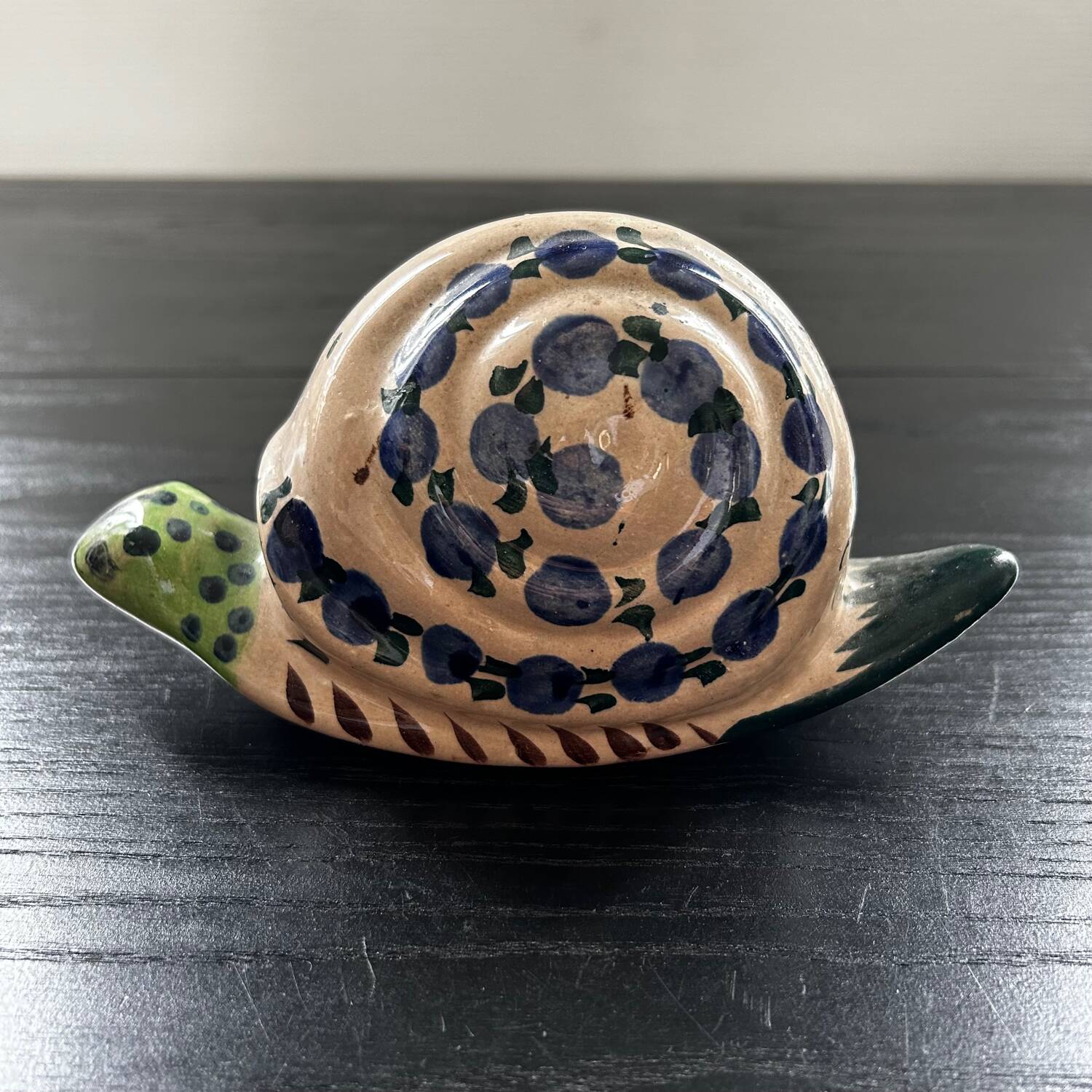 Painted stoneware snail