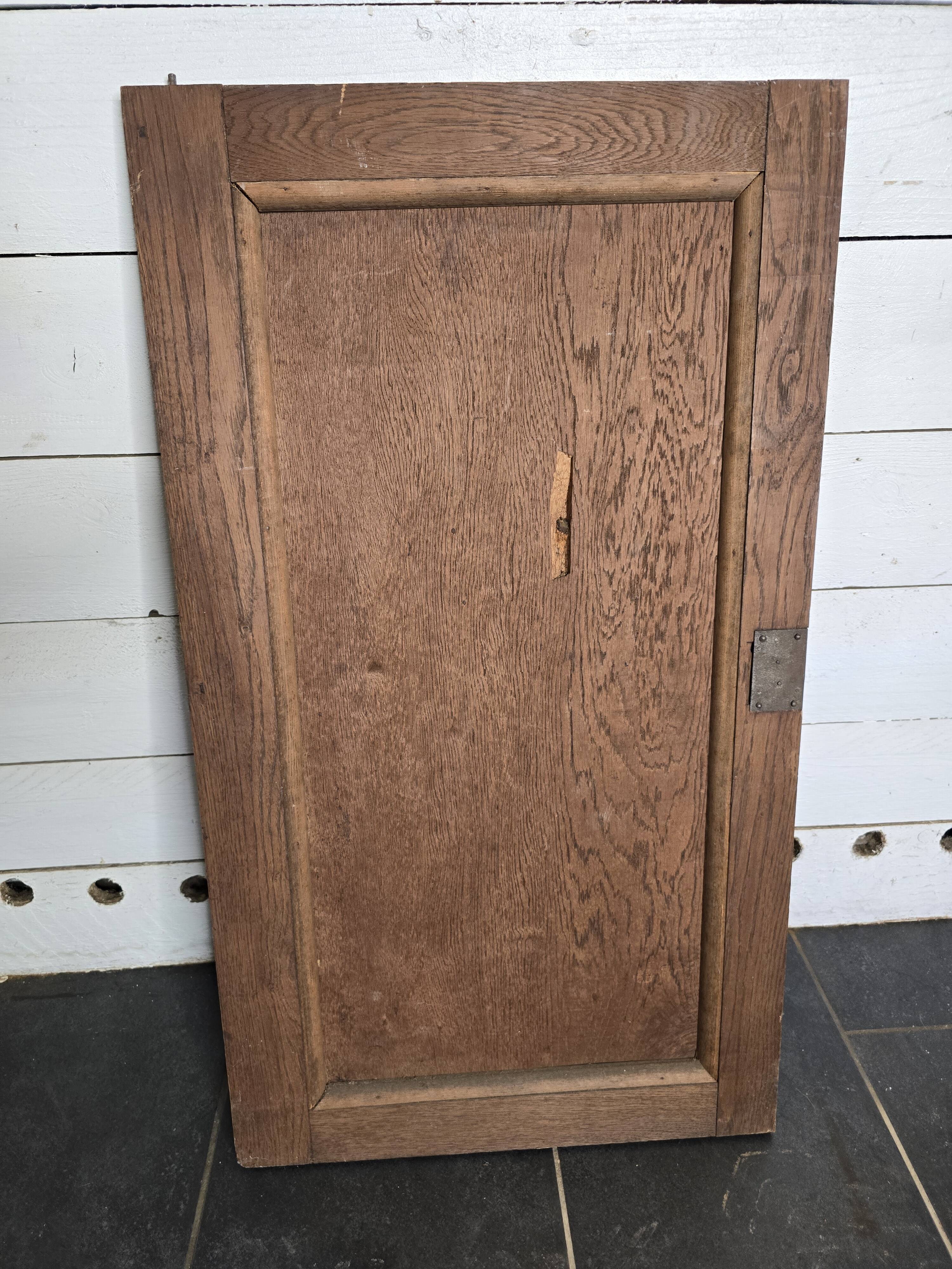 Old wooden door carved from oak