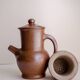 Handcrafted stoneware teapot with strainer