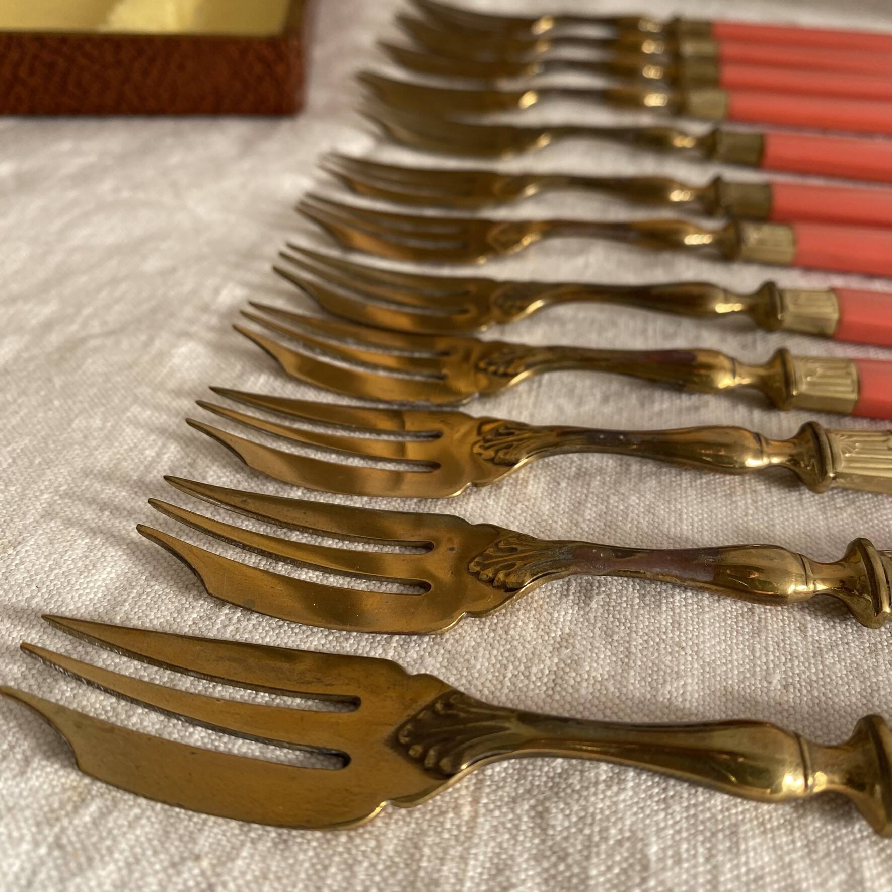 Set of 12 coral and gold dessert forks