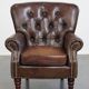 Fauteuil Chesterfield en cuir de vachette grainé marron couleur cognac