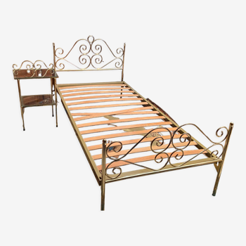 Romantic style single bed in brass with bedside table