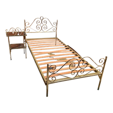 Romantic style single bed in brass with bedside table