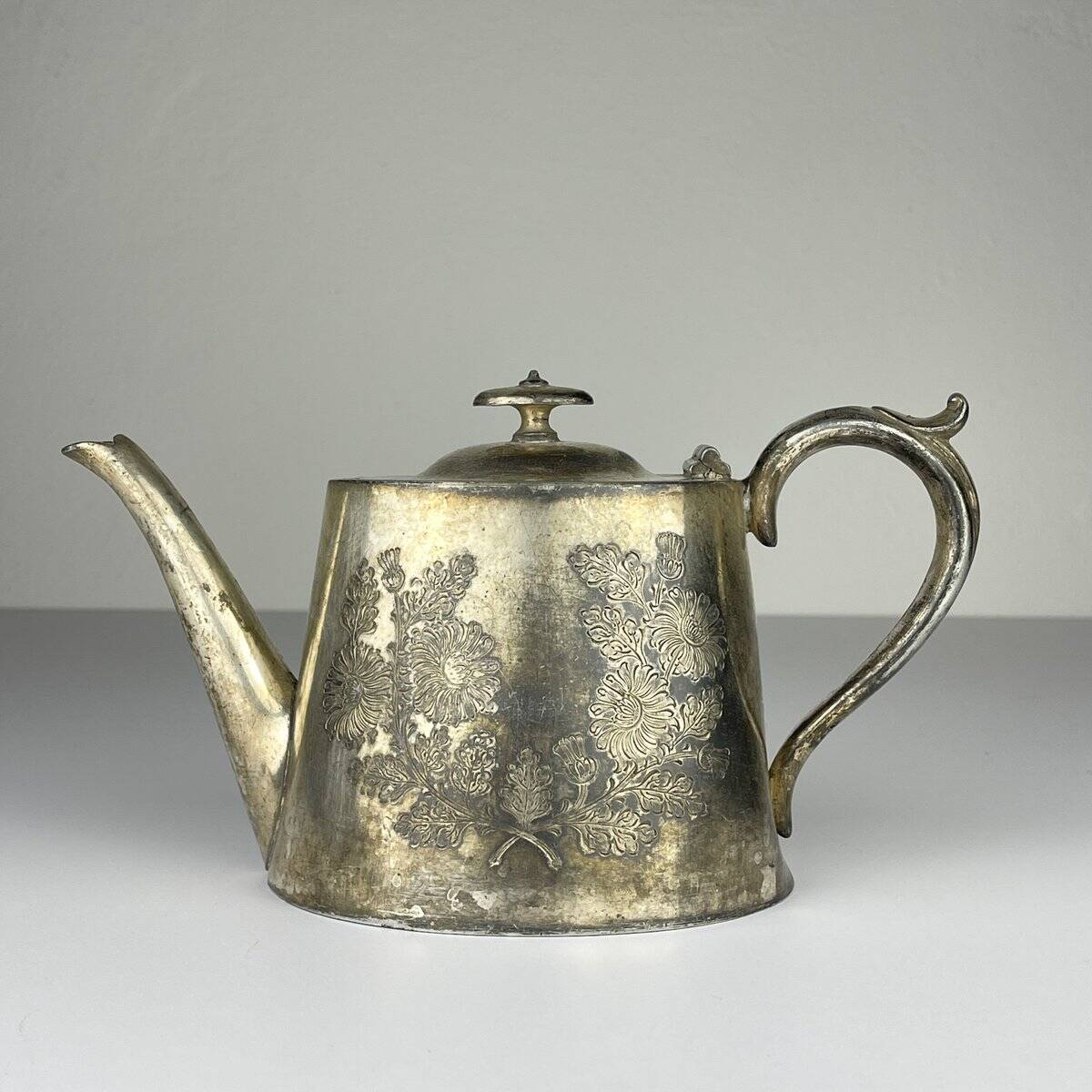 Antique silver-plated teapot from Sheffield, England, 1890-1910.