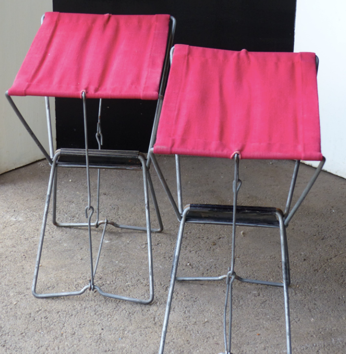 Pair of folding stools in red canvas and metal