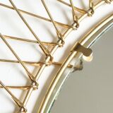 Oval golden metal sun mirror, 60s