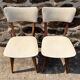 Pair of vintage chairs with upholstered backrest and seat, 1950s style.