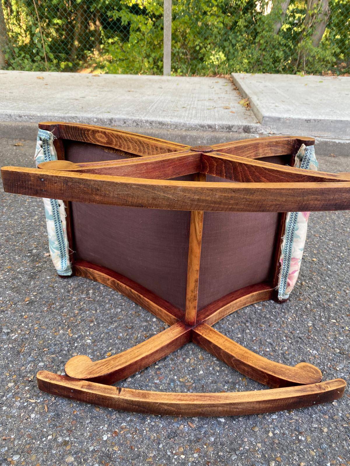 Kneeling prayer desk with rocking footrest in solid wood, curule style & floral fabric.