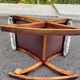 Kneeling prayer desk with rocking footrest in solid wood, curule style & floral fabric.