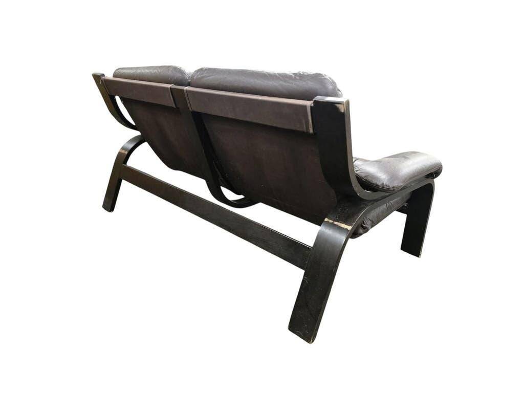 Vintage brown leather two-seater sofa