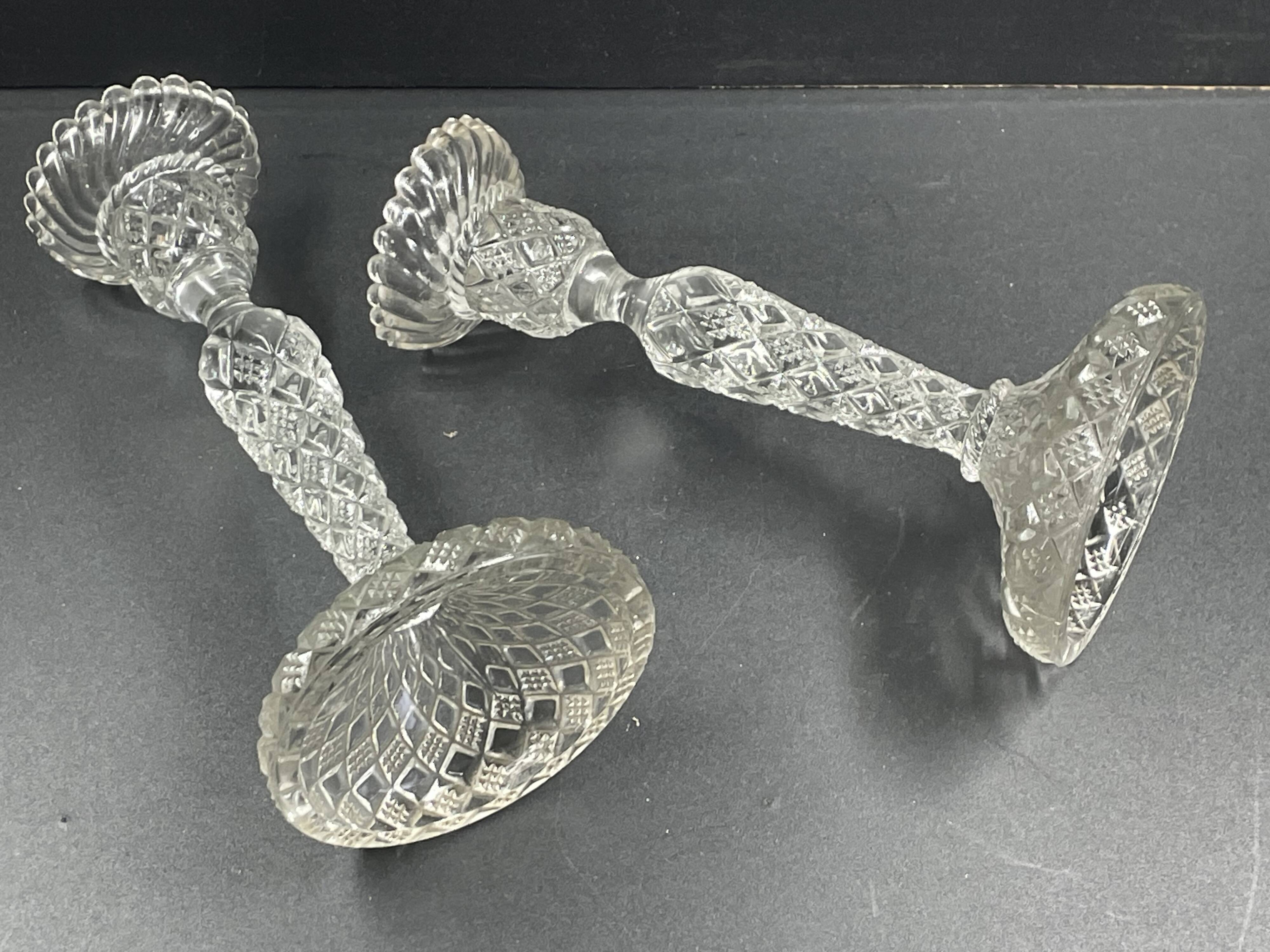 Pair of candle holders in molded glass