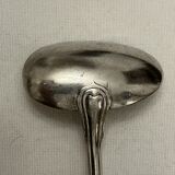 Silver metal sauce spoon