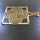Dessous de plat graphique en laiton