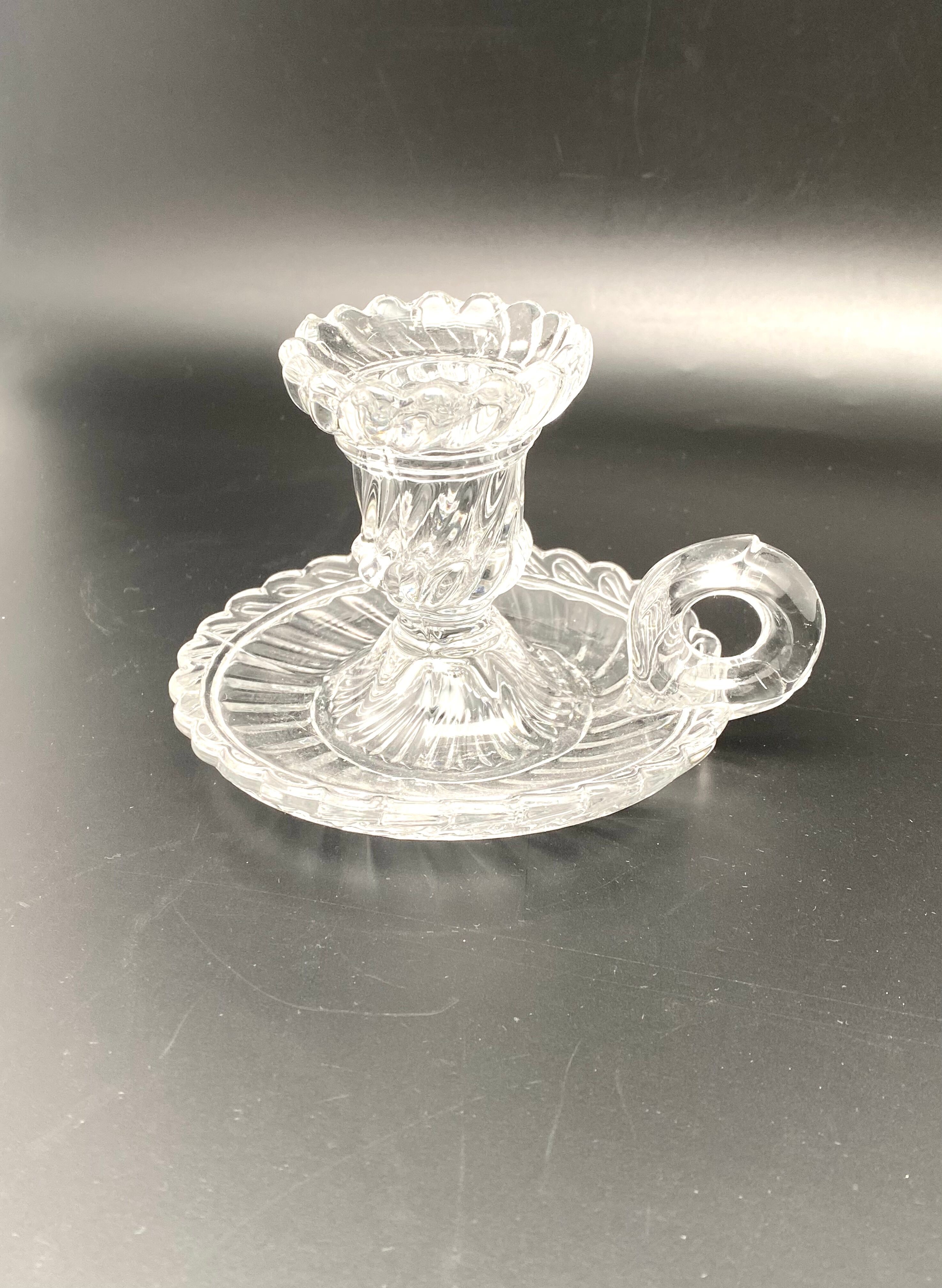 Candle holder with cup and handle in worked glass