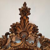 Italian mirror in gilded scupted wood