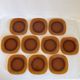 Set of 10 square Vereco plates in amber glass