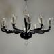 Venetian chandelier in Murano glass in black and colourless, 12 light arms, circa 1990.