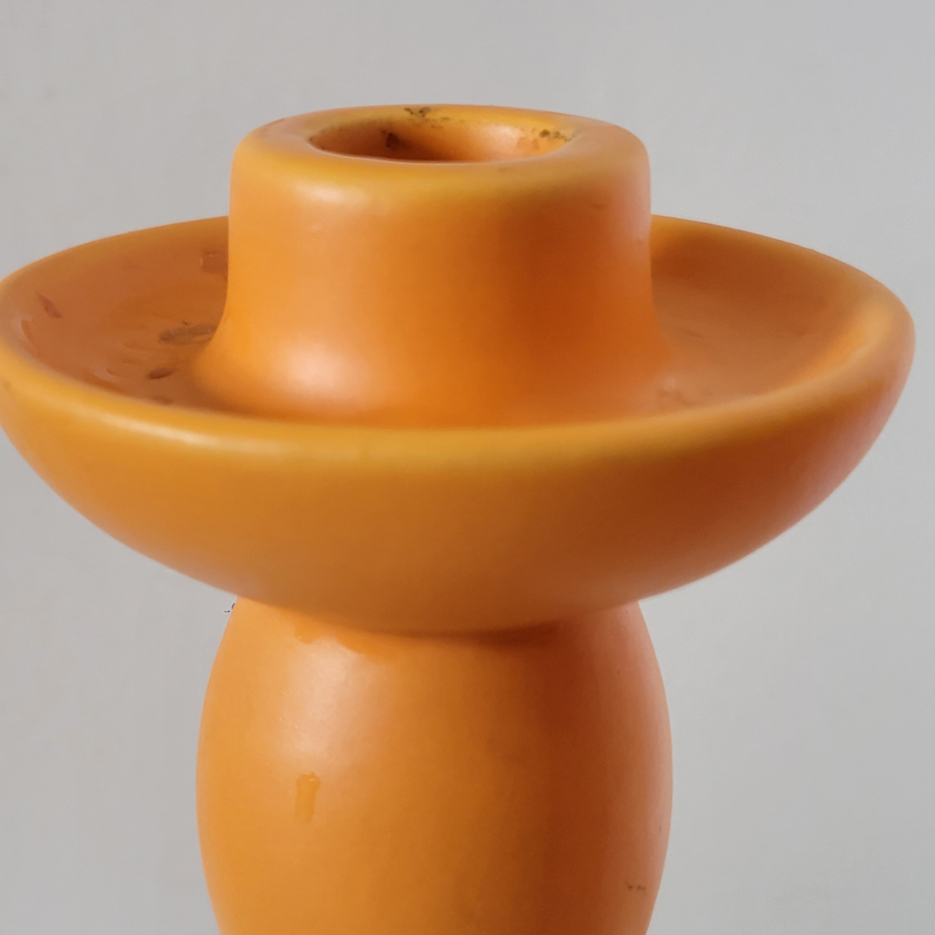 2 orange ceramic candle holders