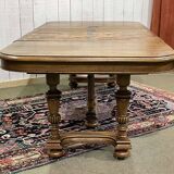 Henri II walnut table from the early 20th century with extensions.