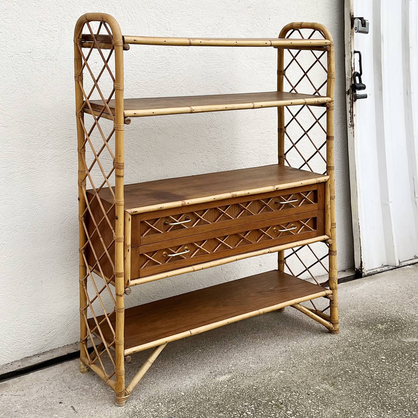 Rattan and bamboo bookcase by Louis Sognot