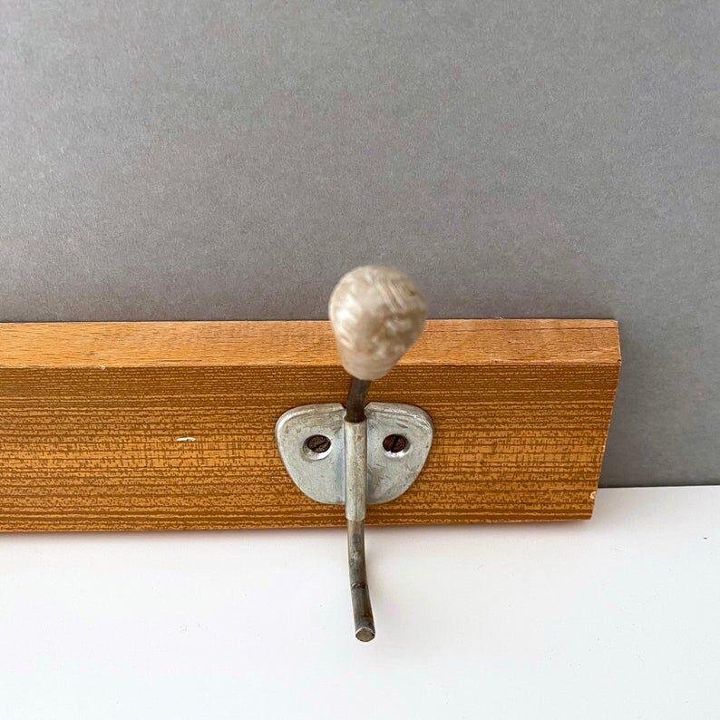 Wooden wall coat holder from the 1950s