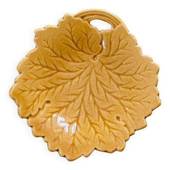 Vintage soap dish in ochre faience, leaf shape.