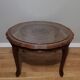 Table basse cannée en bois et verre