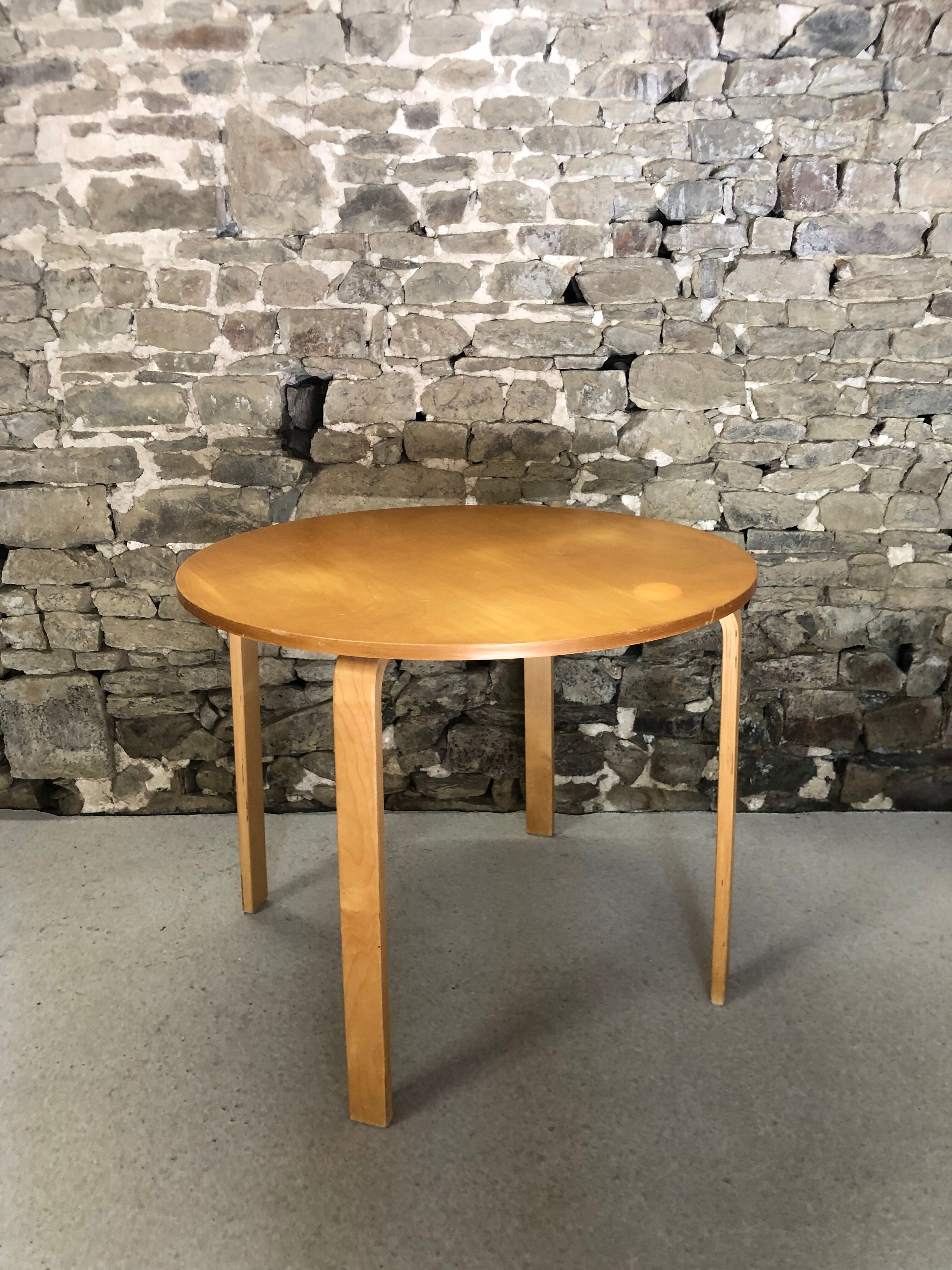 Round dining table in vintage wood