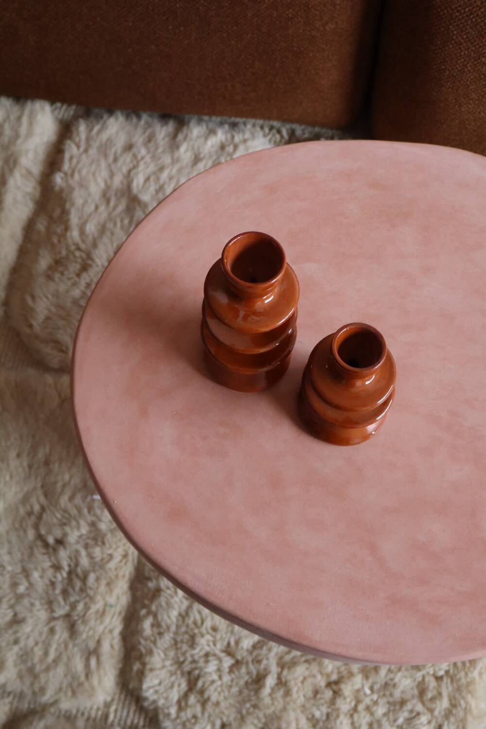 Organic shaped coffee table in pink teracotta tadelakt