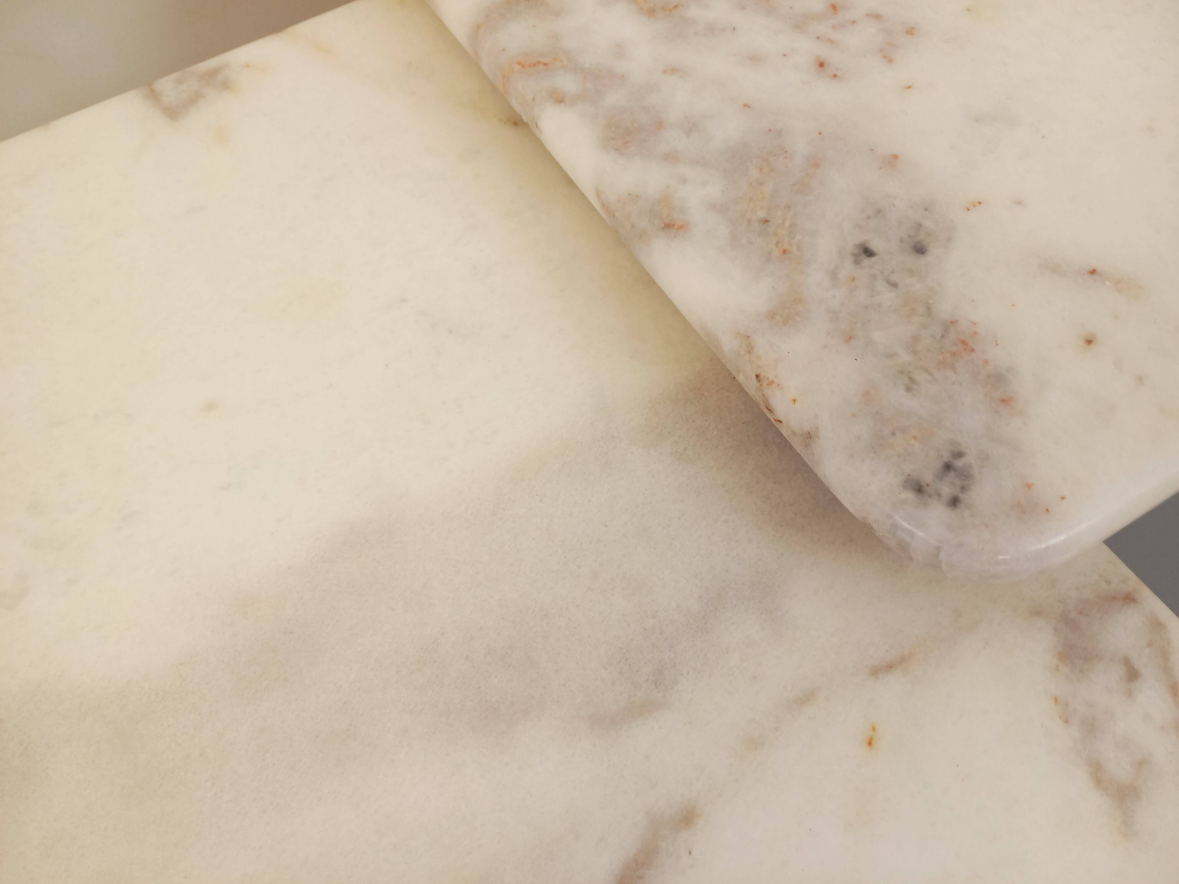 Pair of vintage nesting coffee tables in white marble from the 1970s.