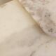 Pair of vintage nesting coffee tables in white marble from the 1970s.